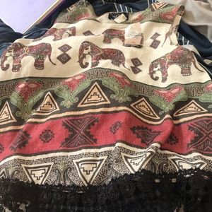 A elephant shirt from rainbow clothing store